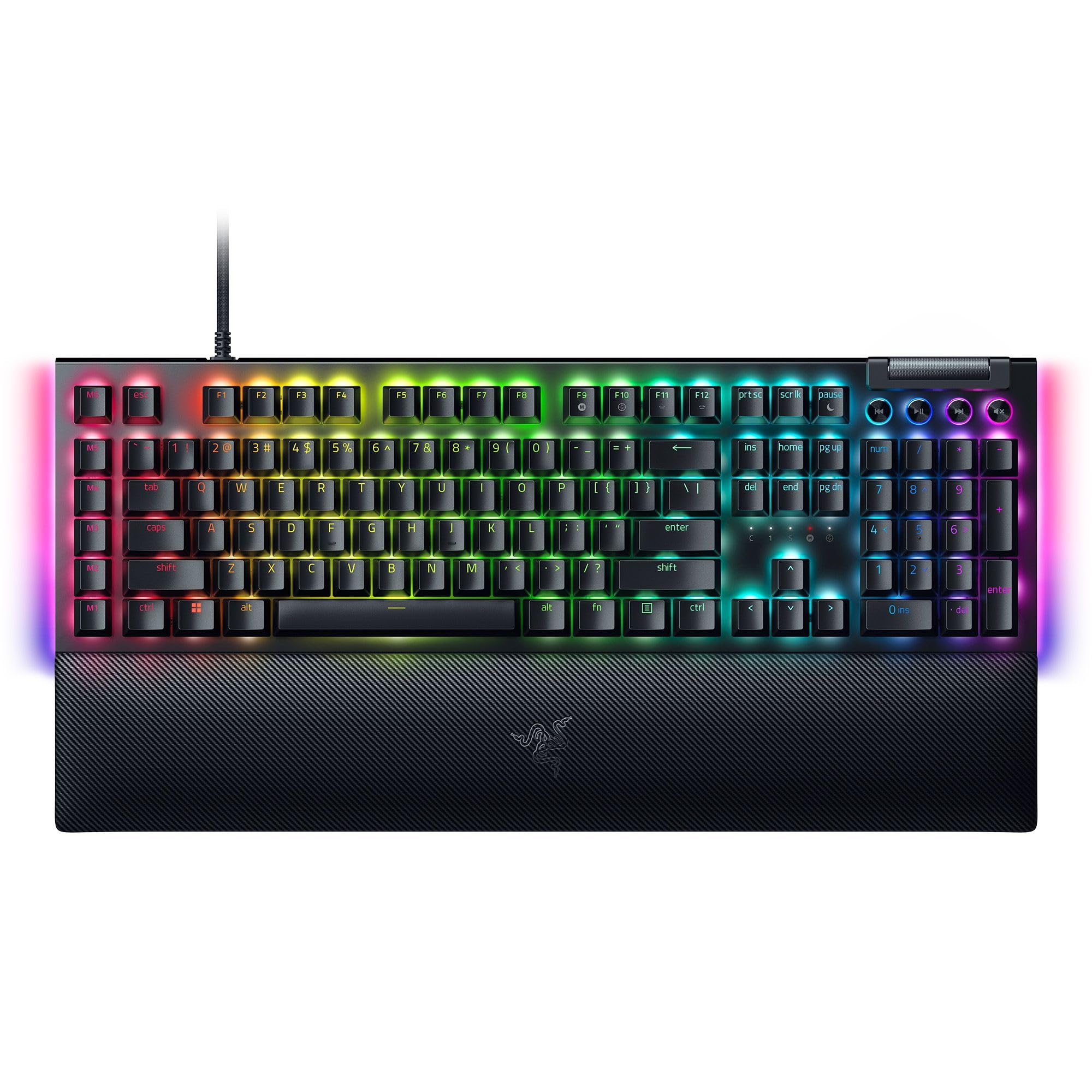 Razer BlackWidow V4 Mechanical Gaming Keyboard, Green Switches Tactile & Clicky, Chroma RGB, 6 Dedicated Macro Keys, Magnetic Wrist Rest, Doubleshot ABS Keycaps - Black US Layout BlackWidow V4 Black
= 
کیبورد بازی مکانیکی Razer BlackWidow V4، سوئیچ‌های سبز تاکتیل و کلیکی، رنگ‌های RGB Chroma، 6 کلید ماکرو اختصاصی، قطب تکانده کننده مچ دست، کلیدهای ABS دوبل شات - طراحی مشخصه US مدل BlackWidow V4 سیاه