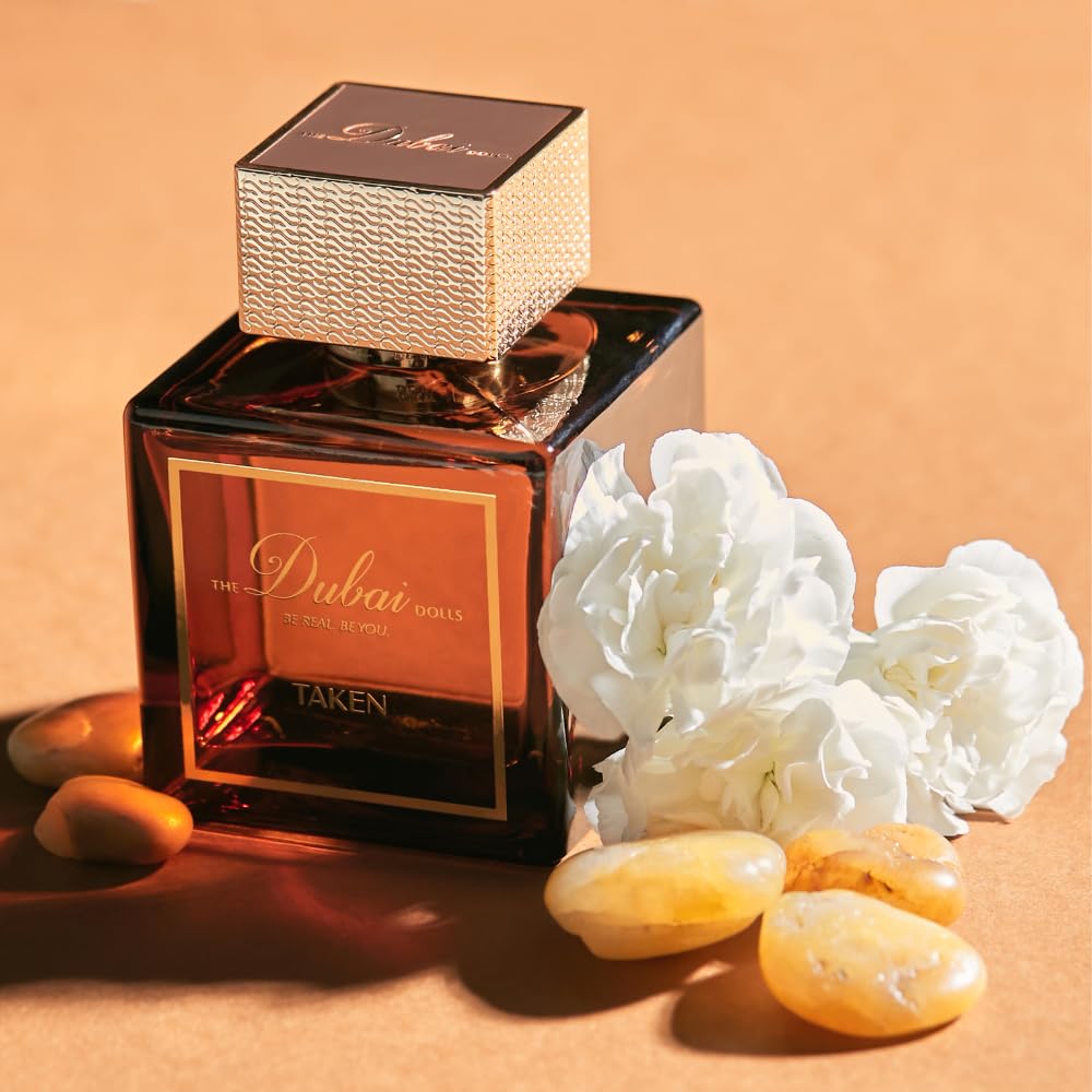 عطر لوکس Dubai DOLLS برای زنان - TAKEN | عطر عود با رایحه چوبی و پایانی جذاب | مناسب برای روز و شب | یاسمین، زعفران و عنبر (100 میلی لیتر)