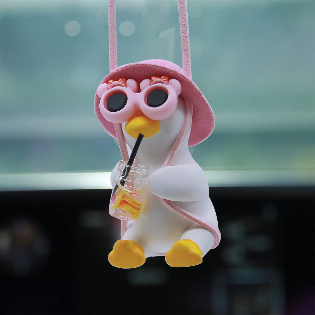 ترجمه: زیبوک دست‌هنداز اتومبیل ارگانز ‌ Cool Swinging Duck براق چرخ فلزی تزئینات پنجره داخلی و دکوراسیون آینه عقب و لوازم جانبی آینه عقب اتومبیل
